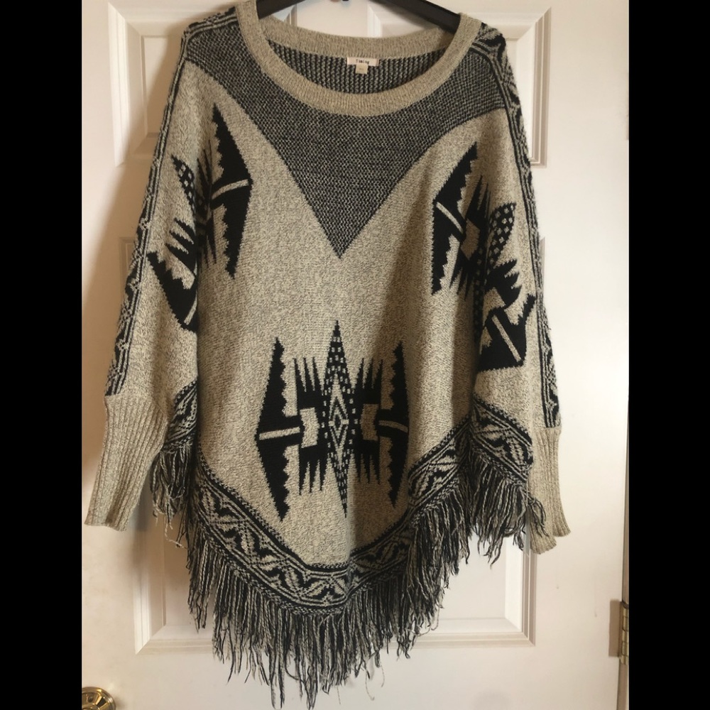 Women’s patterned poncho sweater
